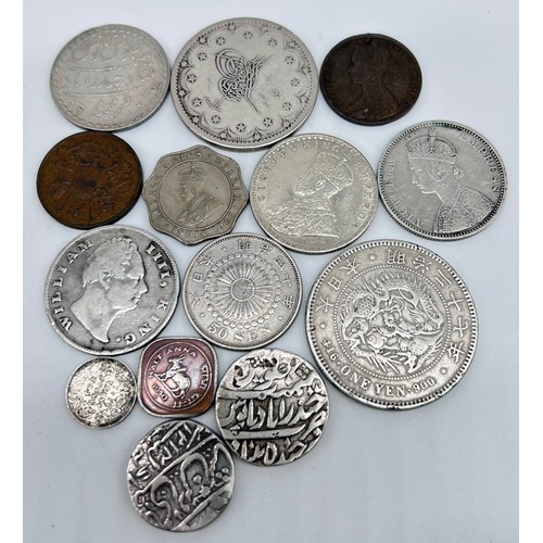 40 - A mixed group to include; INDIA 1835 one rupee, 1911, and 1878; Two Annas 1902; four Annas 1920; 183... 