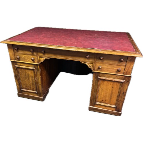 213 - Victorian walnut pedestal desk, the rectangular surface above a long drawer and flanked by two short... 