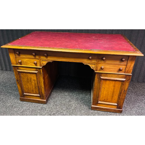 213 - Victorian walnut pedestal desk, the rectangular surface above a long drawer and flanked by two short... 