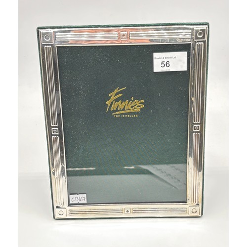 56 - Sterling silver photo frame by Finnies of Aberdeen with green silk lining and velvet back 
(To fit 8... 