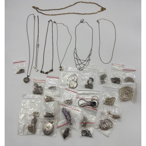 21 - Collection of 30 silver chains and pendants