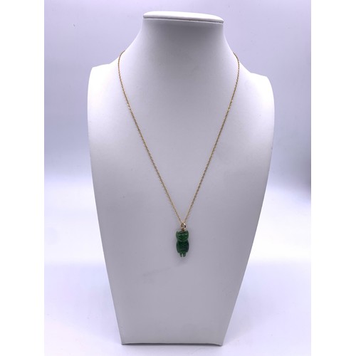 6 - 9ct Gold necklace with green jade owl pendant