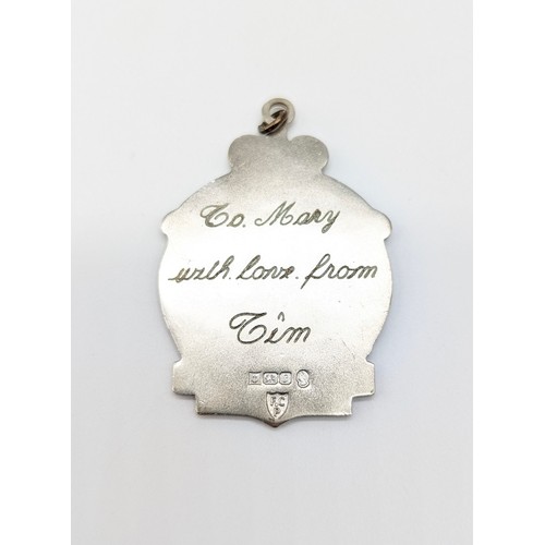 101 - Commemorative silver jubilee pendant, with inscription