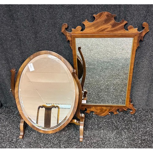 225 - Reproduction swing oval bevel edge mirror together with one other