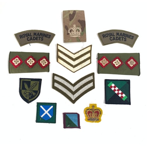 141 - British army officers Sam Browne belt, together with various officer epaulettes and other badges and... 