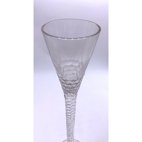 80 - Late 19th century cut glass toasting glass with a multi air twist stem
Height - 46cm
(Damage seen in... 