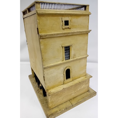 92 - Mid 19th century Palladian style doll's house.
The façade with four floors, the roof with pierced ga... 