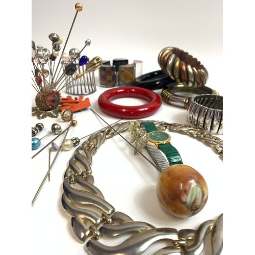 43 - Collection of costume jewellery to include silver bangle (32g), resin bracelet possibly by modernist... 