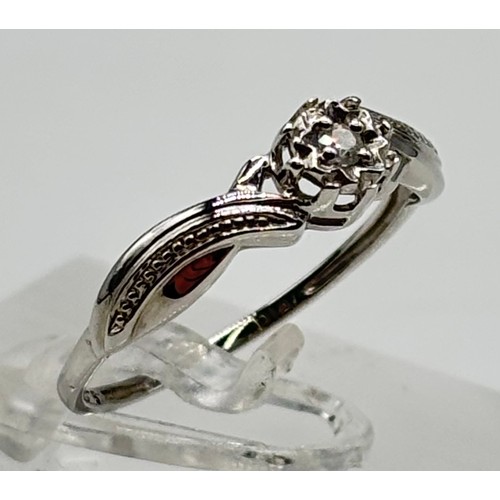 23 - 9ct white gold and diamond ladies ring
Weight - 1.52g
Size - N