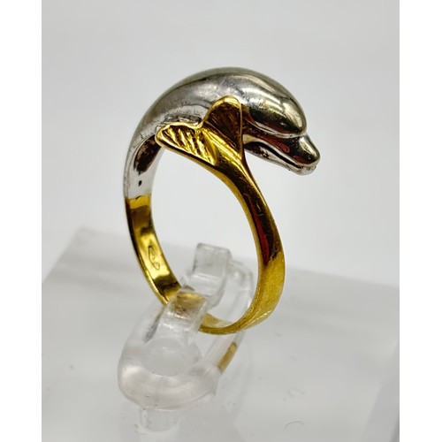 25 - 18ct gold two tone dolphin ring, marked 750
Weight - 4.29g
Size - N