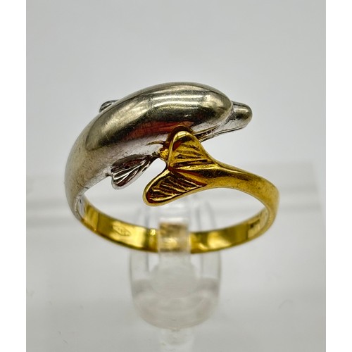 25 - 18ct gold two tone dolphin ring, marked 750
Weight - 4.29g
Size - N