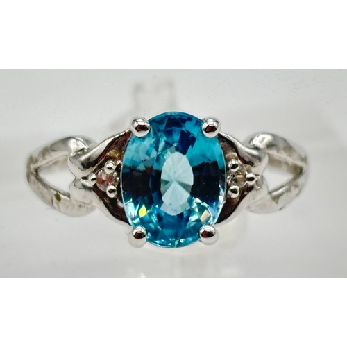 27 - 10ct white gold ladies ring with blue topaz stone 
Weight - 2.52g
Size - P