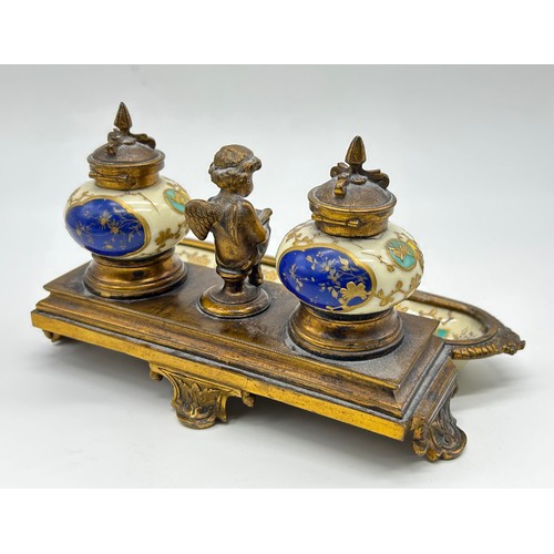 3 - Late 19th century gilt metal and porcelain desk inkstand the shaped base with full width porcelain p... 