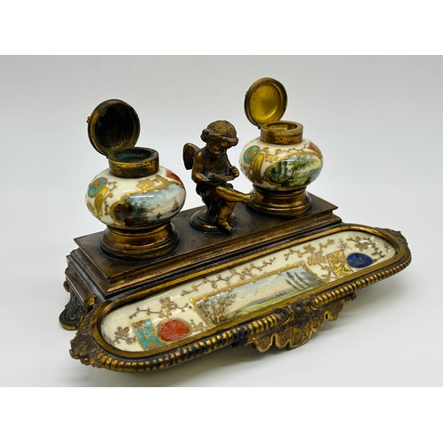 3 - Late 19th century gilt metal and porcelain desk inkstand the shaped base with full width porcelain p... 