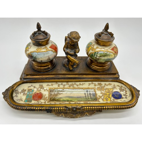 3 - Late 19th century gilt metal and porcelain desk inkstand the shaped base with full width porcelain p... 