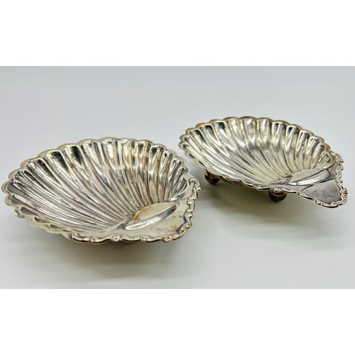 11 - Pair of silver scallop shell dishes Possibly William Davenport, Birmingham, 1903, of open shell form... 