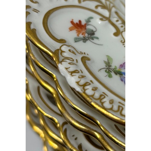 63 - Set of 9 Meissen porcelain dishes with openwork rims, the central roundel decorated with spaced flow... 