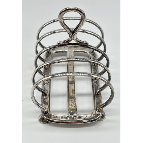 53 - Silver toast rack, Harrison Brothers & Howson, Sheffield c1930 together with silver fork, William El... 