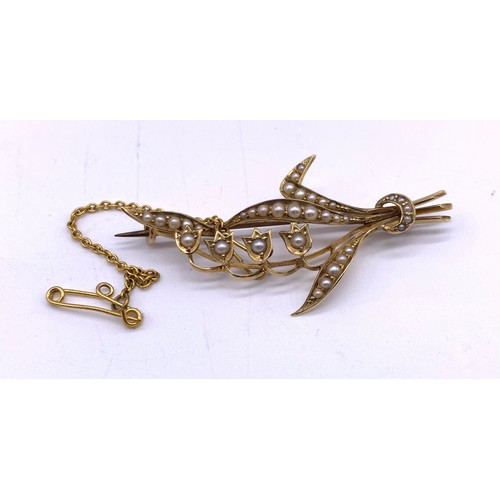 57 - 15ct gold and seed pearl ladies brooch (4.52g) together with 9ct gold ladies ring (1.23g)
Ring Size ... 