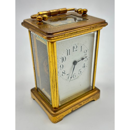 86 - Antique Brass and bevel glass French carriage clock. Single barrel movement. [Needs attention]