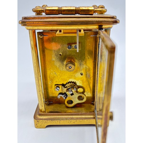 86 - Antique Brass and bevel glass French carriage clock. Single barrel movement. [Needs attention]