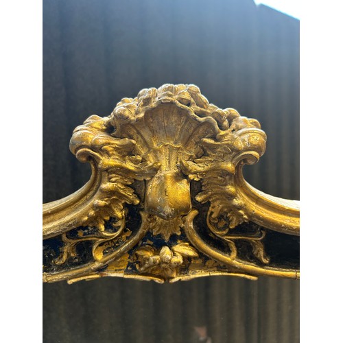 200 - Antique French gilded fire screen with scroll and acanthus detail raised on trestle legs [110x64cm]