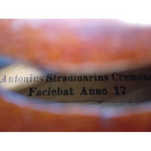 261 - German Violin marked Antonius Stradiuarius Cremonensis Fabiebat Anno17 within a fitted case with bow... 