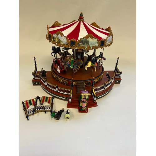 292 - A Mr. Christmas around the world Carousel, (has been tested, lights, turning motion & songs all in w... 