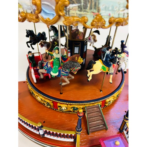 292 - A Mr. Christmas around the world Carousel, (has been tested, lights, turning motion & songs all in w... 