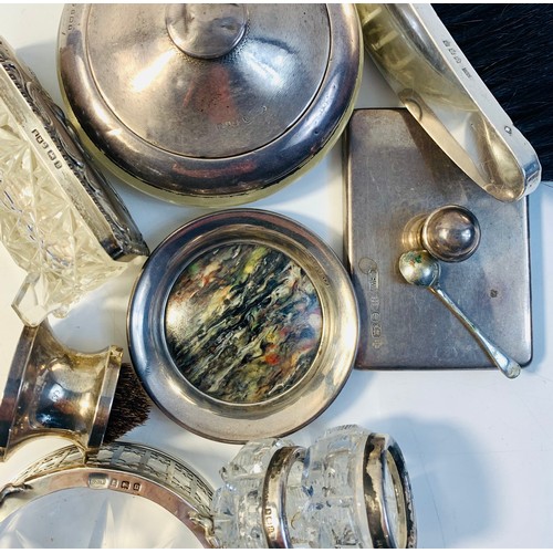 87 - Mixed lot of silver items to include silver desk paperweight, Laurence R Watson & Co, Birmingham 200... 