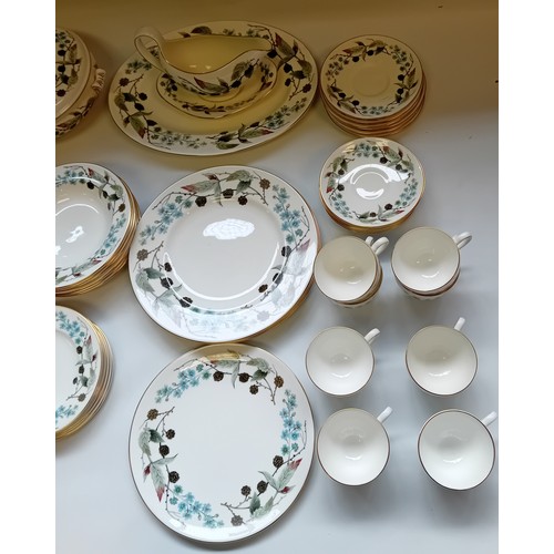 411 - Wedgwood ''Spring Morning'' Dinner Service together with Royal Doulton ''Burgundy'' plates and bowls... 