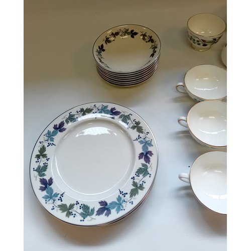 411 - Wedgwood ''Spring Morning'' Dinner Service together with Royal Doulton ''Burgundy'' plates and bowls... 