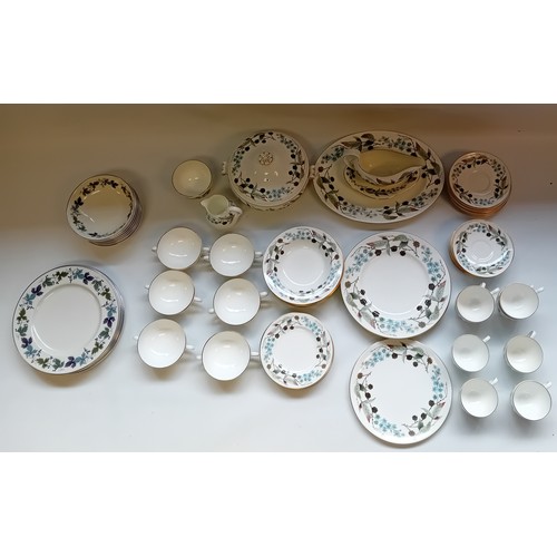 411 - Wedgwood ''Spring Morning'' Dinner Service together with Royal Doulton ''Burgundy'' plates and bowls... 