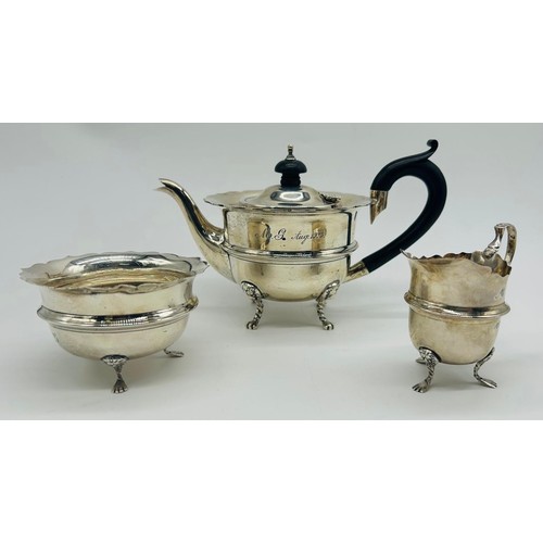 29 - Silver teapot, sugar and cream jug, F H Adams Ltd, Birmingham 1911

Weight - 344g
(Cream jug not hal... 