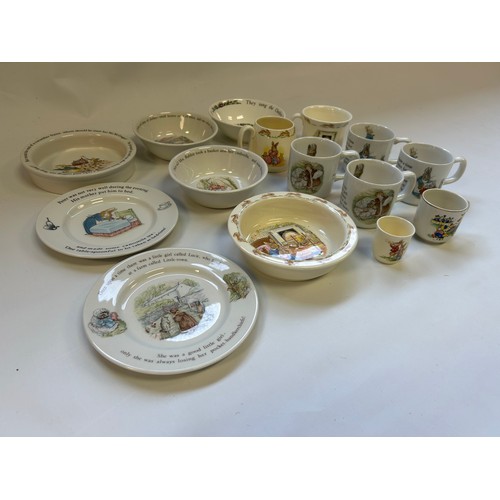 405 - A collection of Wedgewood Peter Rabbit and Royal Doulton, To include plates and cups.