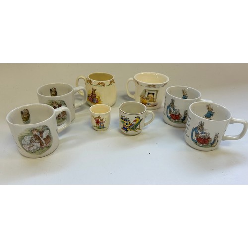 405 - A collection of Wedgewood Peter Rabbit and Royal Doulton, To include plates and cups.