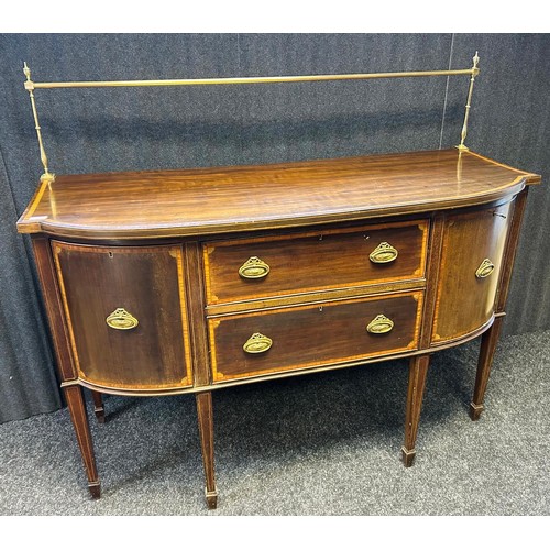 314 - A 19th century side board, the brass top rail above a shaped surface and two drawers flanked by two ... 