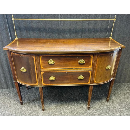 314 - A 19th century side board, the brass top rail above a shaped surface and two drawers flanked by two ... 