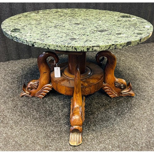 241 - X-circular centre low table, Green marble top on centre pedestal, four carved feet. [53.5x82cm]