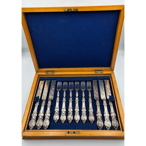 45A - Silver handled canteen of fruit forks and knives, Sheffield, early 20th century