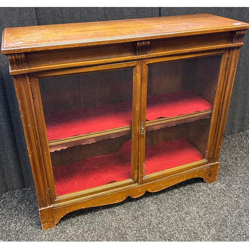 223 - Antique mahogany bookcase, two glazed doors opening to two interior shelves [98x110x35cm]