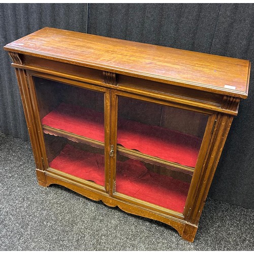 223 - Antique mahogany bookcase, two glazed doors opening to two interior shelves [98x110x35cm]