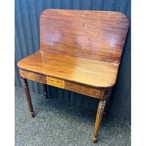 207 - 19th Century Flip top table, the D shaped surface above an inlaid frieze raised on turned tapered le... 