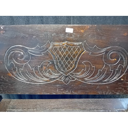 323 - Carved Oak Monks Bench with flip back 
[107x96x43cm]