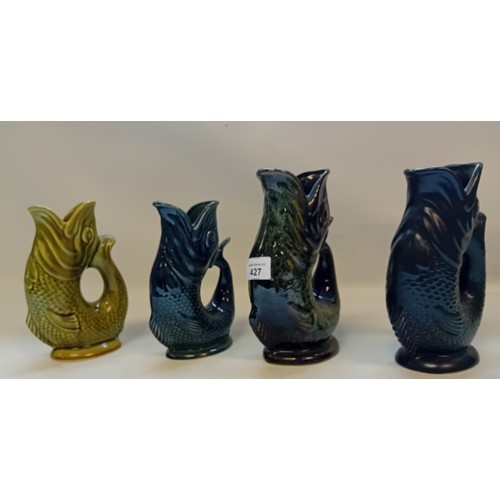 427 - Set of Four vintage Fosters Studio Pottery fish shaped gluggle Jugs