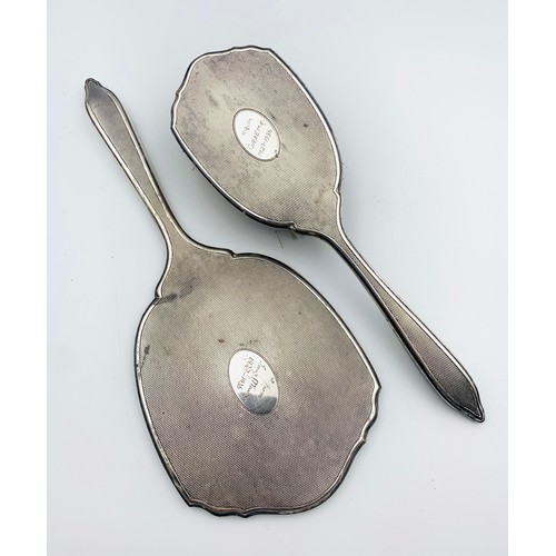 70A - Silver backed dressing table mirror and brush, Barker Brothers Silver Ltd, Birmingham 1934