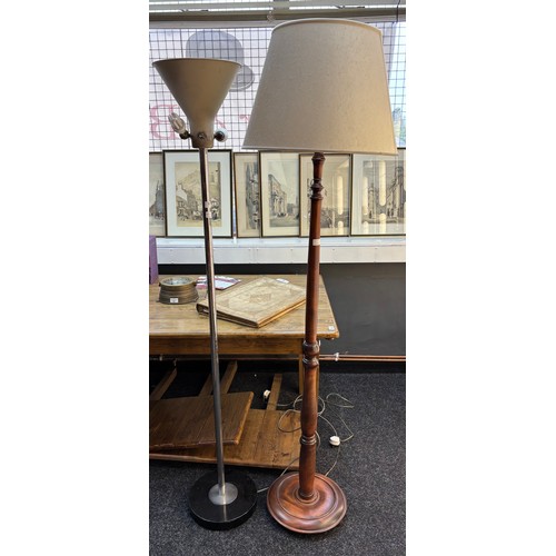321 - An industrial design free standing up lighter together with a 20th century mahogany free standing la... 