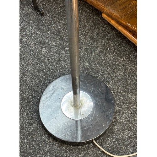 321 - An industrial design free standing up lighter together with a 20th century mahogany free standing la... 