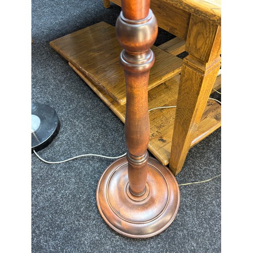 321 - An industrial design free standing up lighter together with a 20th century mahogany free standing la... 