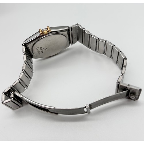 30 - OMEGA - a bi-metal Constellation quartz calendar bracelet watch circa 1991, champagne dial with dot ... 